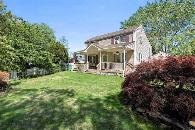 31 Wagon Ln E, Centereach, NY 11720 - traditional home featuring covered porch