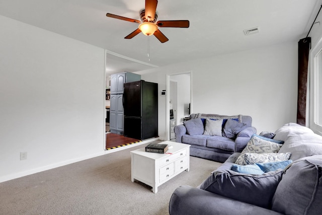 10 Van Wyck Dr, Poughkeepsie, NY 12601 - living area with ceiling fan, light carpet, and baseboards