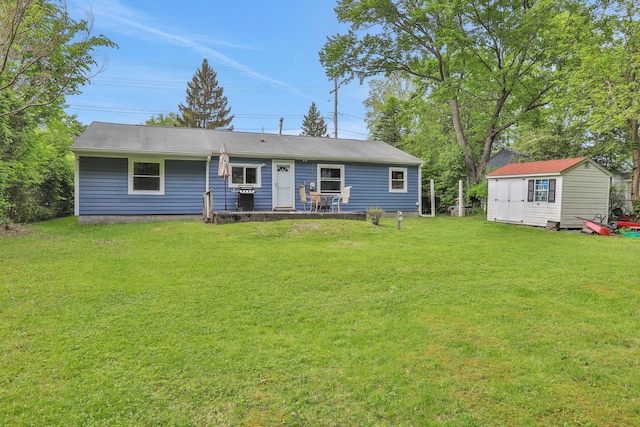 10 Van Wyck Dr, Poughkeepsie, NY 12601 - rear view of property with a lawn, an outbuilding, and a shed