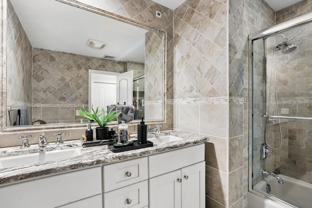 12 Rockridge Rd, Ardsley, NY 10502 - full bathroom featuring tile walls, enclosed tub / shower combo, and double vanity