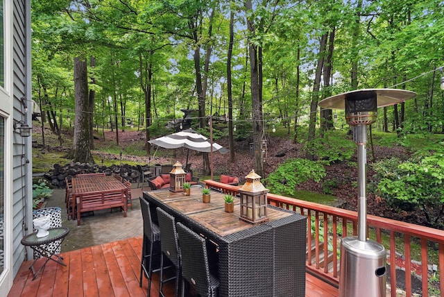 12 Rockridge Rd, Ardsley, NY 10502 - wooden terrace with view of wooded area and outdoor dining space