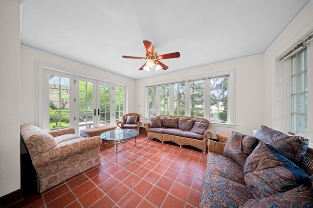 681 W 231st St, Bronx, NY 10463 - living area with french doors, healthy amount of natural light, dark tile patterned flooring, a ceiling fan, and ornamental molding