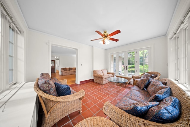681 W 231st St, Bronx, NY 10463 - living area with ceiling fan, tile patterned flooring, baseboards, and ornamental molding