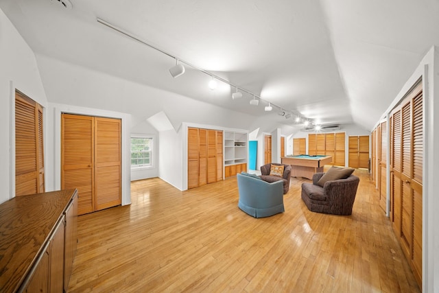 681 W 231st St, Bronx, NY 10463 - living room with billiards, lofted ceiling, light wood-type flooring, and rail lighting