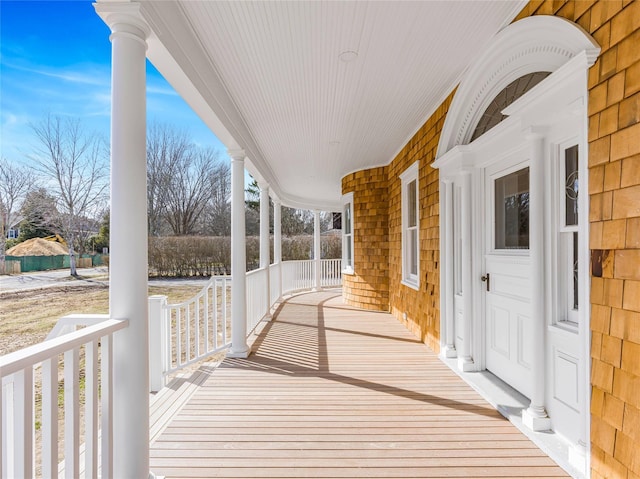 30 Huntting Ln, East Hampton, NY 11937 - wooden terrace featuring covered porch