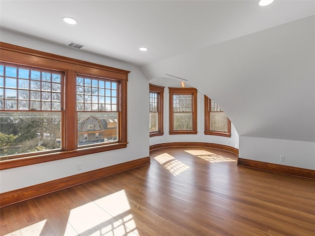 30 Huntting Ln, East Hampton, NY 11937 - additional living space featuring baseboards, wood finished floors, lofted ceiling, and recessed lighting