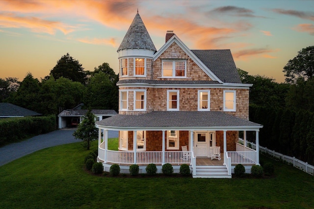 30 Huntting Ln, East Hampton, NY 11937 - view of front of house with a chimney, a porch, and roof with shingles