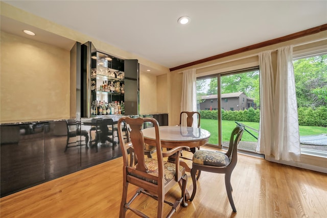 4 Bobby Close, Mamaroneck, NY 10543 - dining space with a bar, light wood-type flooring, plenty of natural light, and recessed lighting