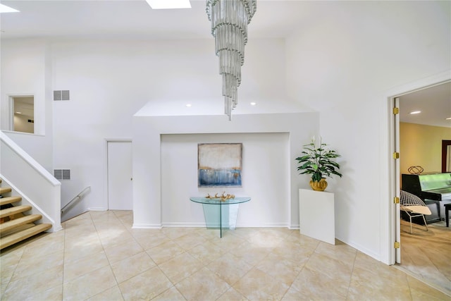 4 Bobby Close, Mamaroneck, NY 10543 - tiled entrance foyer with stairway, a high ceiling, and recessed lighting