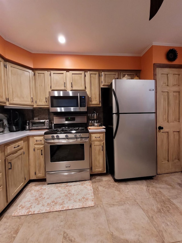 69 Laudaten Way, Warwick, NY 10990 - kitchen with stainless steel appliances, crown molding, backsplash, light countertops, and light brown cabinets