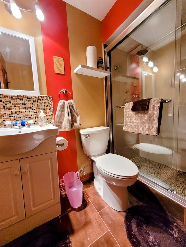 69 Laudaten Way, Warwick, NY 10990 - full bath with toilet, a shower stall, backsplash, tile patterned flooring, and vanity
