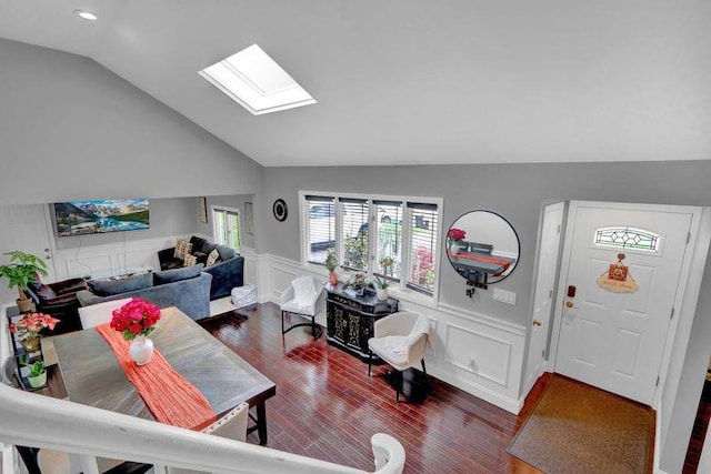11 Mallard Ave, Selden, NY 11784 - living area with a skylight, lofted ceiling, dark wood-style floors, a decorative wall, and a wainscoted wall