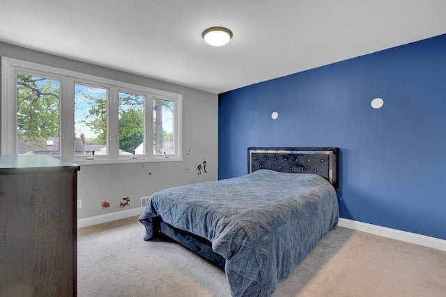 11 Mallard Ave, Selden, NY 11784 - carpeted bedroom with multiple windows and baseboards