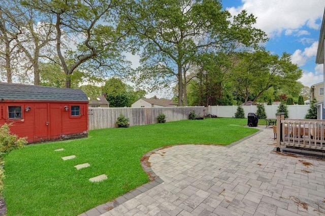 11 Mallard Ave, Selden, NY 11784 - view of yard featuring a patio area, a storage unit, and an outdoor structure