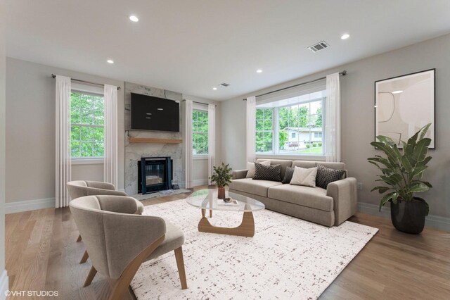 6 Reina Ct, Valley Cottage, NY 10989 - living area with baseboards, a premium fireplace, light wood-style flooring, and recessed lighting