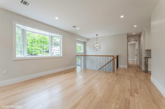 6 Reina Ct, Valley Cottage, NY 10989 - spare room featuring light wood finished floors, recessed lighting, baseboards, and a chandelier