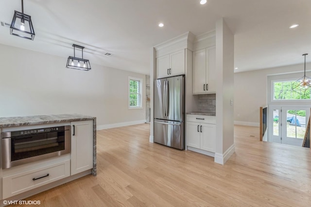 6 Reina Ct, Valley Cottage, NY 10989 - kitchen featuring freestanding refrigerator, baseboards, healthy amount of natural light, and recessed lighting