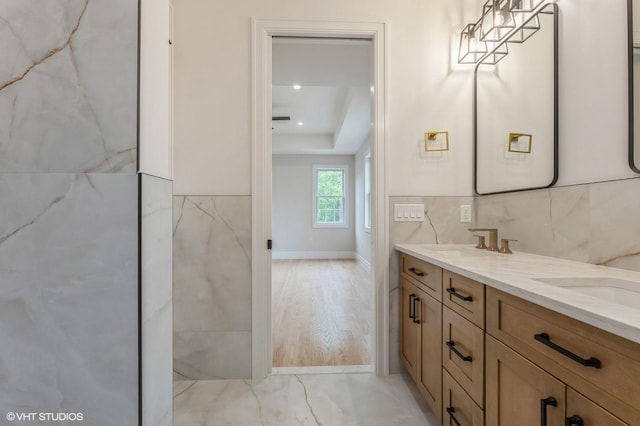 6 Reina Ct, Valley Cottage, NY 10989 - bathroom with double vanity, a raised ceiling, and tile walls