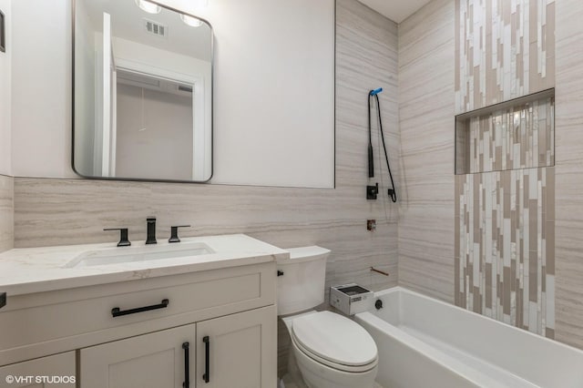 6 Reina Ct, Valley Cottage, NY 10989 - full bathroom featuring toilet, vanity, tub / shower combination, tile walls, and decorative backsplash