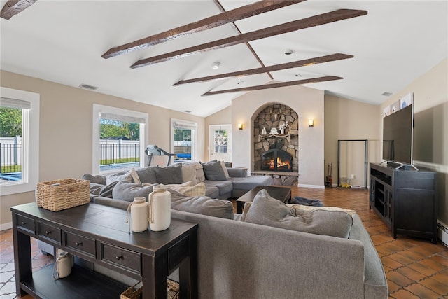979 Manor Ln, Bay Shore, NY 11706 - living area with a stone fireplace and baseboards