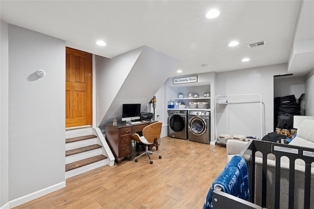 979 Manor Ln, Bay Shore, NY 11706 - bedroom with separate washer and dryer, light wood-style flooring, recessed lighting, a desk, and baseboards