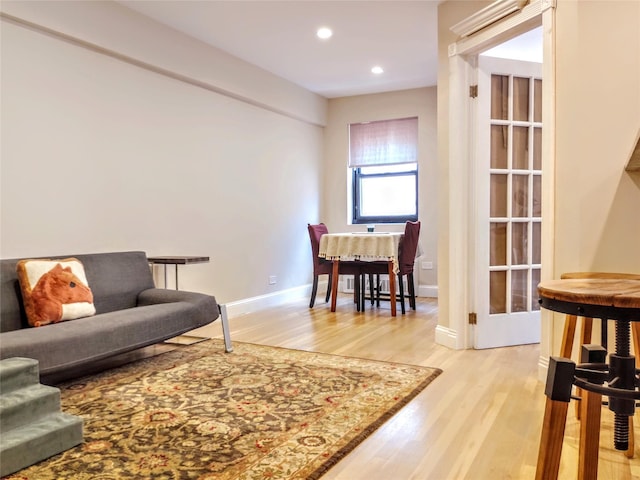 118-60 Metropolitan Ave Unit 6F, Kew Gardens, NY 11415 - living area featuring light wood-type flooring, recessed lighting, and baseboards