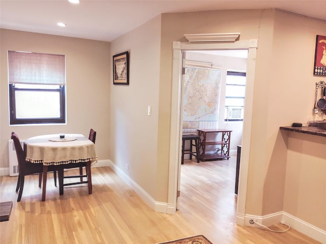 118-60 Metropolitan Ave Unit 6F, Kew Gardens, NY 11415 - dining space featuring light wood finished floors, recessed lighting, and baseboards
