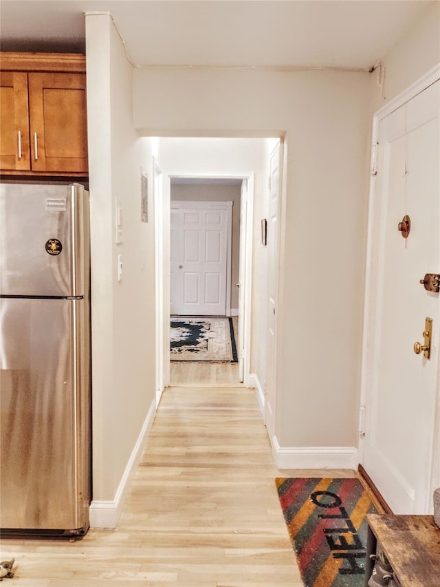 118-60 Metropolitan Ave Unit 6F, Kew Gardens, NY 11415 - corridor with light wood-type flooring and baseboards