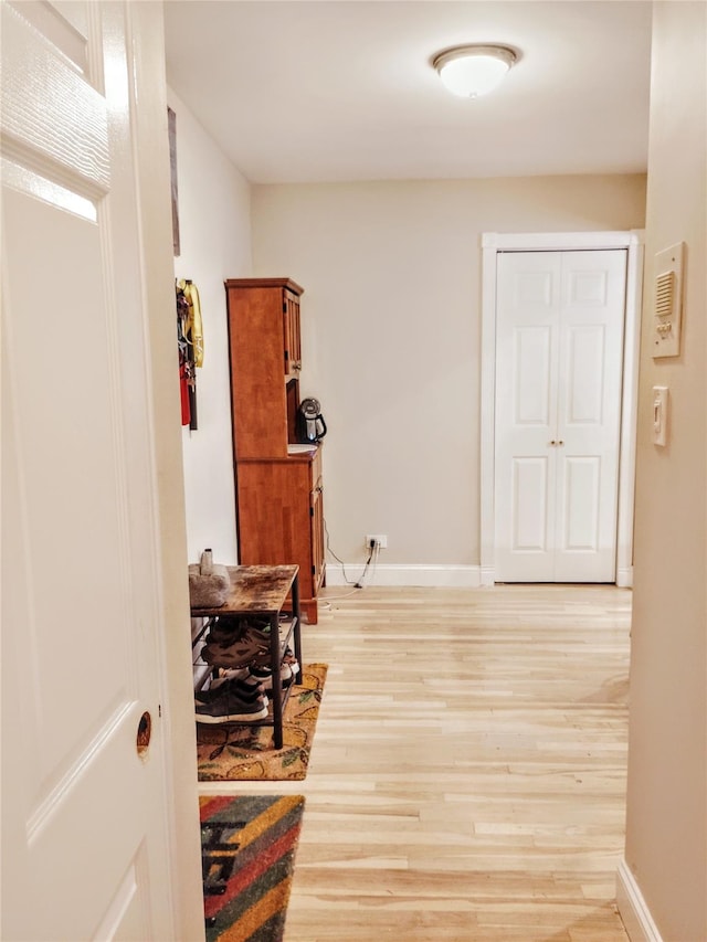 118-60 Metropolitan Ave Unit 6F, Kew Gardens, NY 11415 - hallway with light wood finished floors and baseboards
