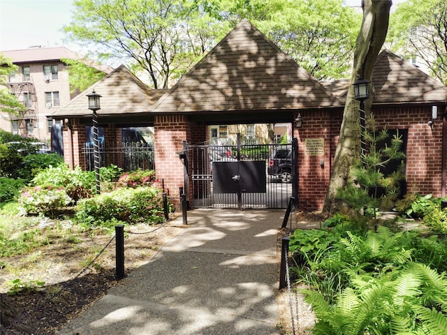118-60 Metropolitan Ave Unit 6F, Kew Gardens, NY 11415 - view of community featuring a gate and fence