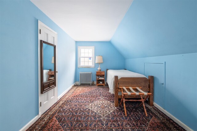 19 Reynal Rd, White Plains, NY 10605 - bedroom featuring radiator, vaulted ceiling, and baseboards