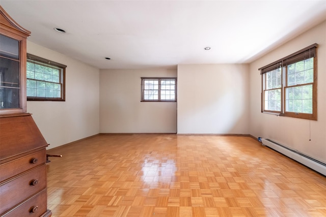 19 Reynal Rd, White Plains, NY 10605 - empty room featuring baseboards, a baseboard heating unit, and recessed lighting