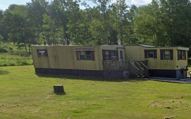 184 Butrick Rd Unit Tr7, Ferndale, NY 12734 - view of front of property featuring a front yard and view of scattered trees