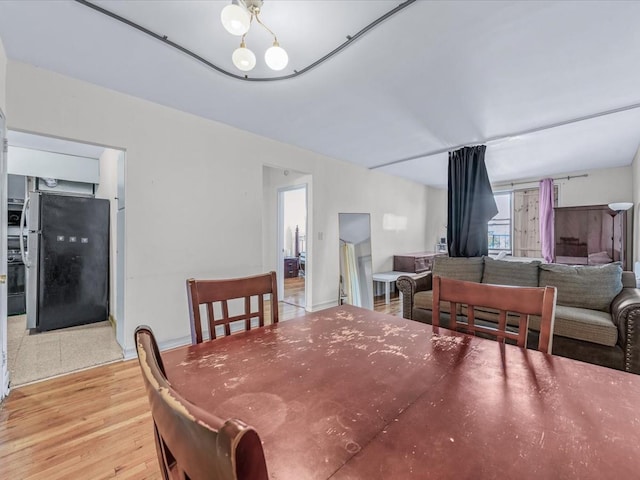 dining room with light wood-style floors