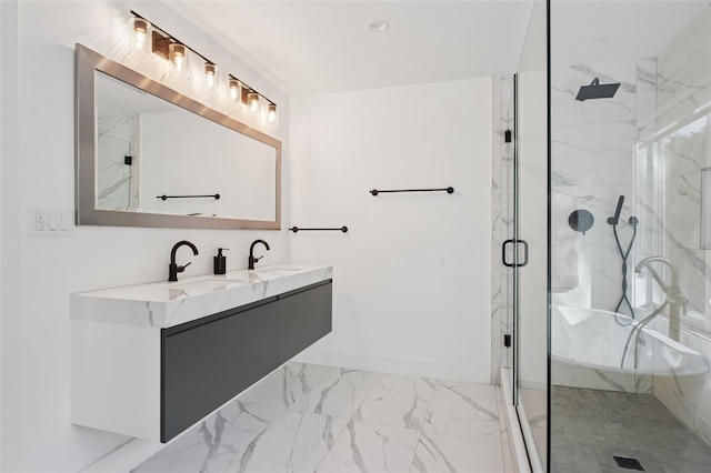 full bath with a marble finish shower, double vanity, marble finish floors, and baseboards