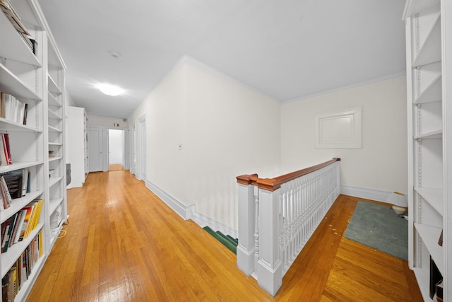 10-08 Shore Rd, Douglaston, NY 11363 - hallway featuring an upstairs landing, light wood-style flooring, and baseboards