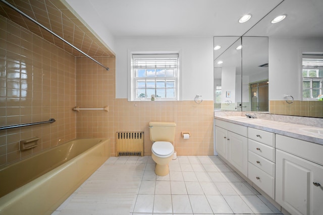 10-08 Shore Rd, Douglaston, NY 11363 - bathroom featuring radiator, tile walls, tile patterned flooring, toilet, and recessed lighting