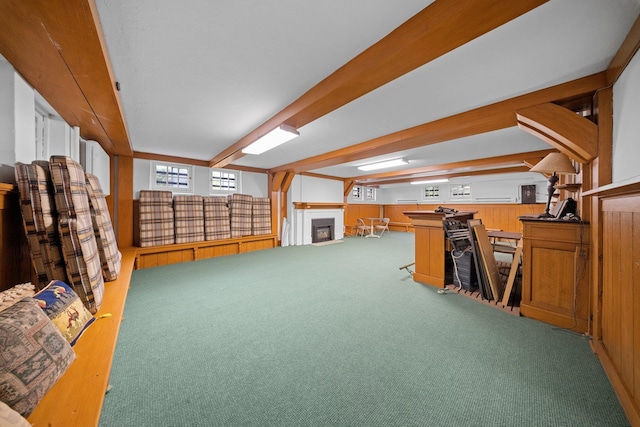 10-08 Shore Rd, Douglaston, NY 11363 - misc room with carpet floors, a fireplace, wooden walls, and beamed ceiling