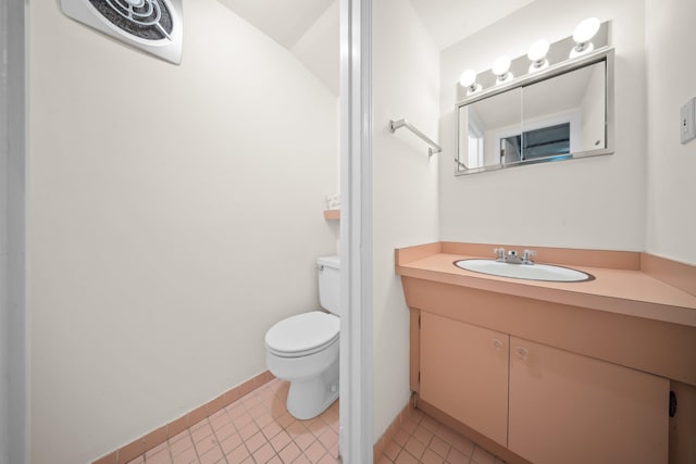 10-08 Shore Rd, Douglaston, NY 11363 - bathroom with toilet, vanity, tile patterned floors, and baseboards