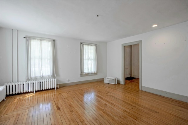 59 E Main St, Washingtonville, NY 10992 - spare room with radiator, light wood-type flooring, and baseboards
