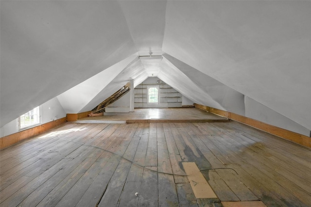 59 E Main St, Washingtonville, NY 10992 - additional living space featuring vaulted ceiling, hardwood / wood-style floors, and plenty of natural light