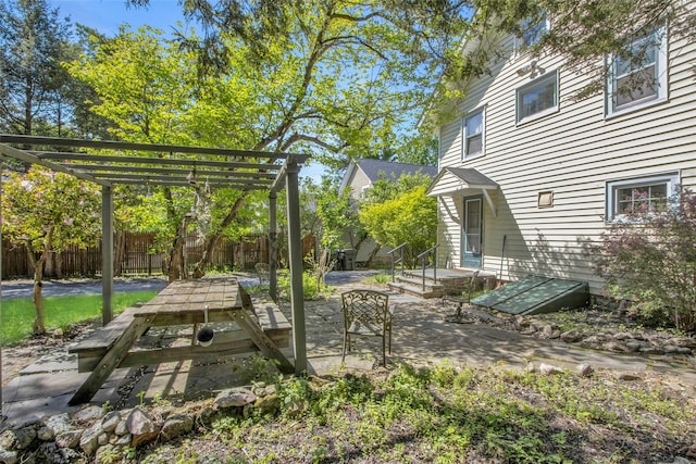 59 E Main St, Washingtonville, NY 10992 - view of yard featuring fence, a pergola, and a patio area