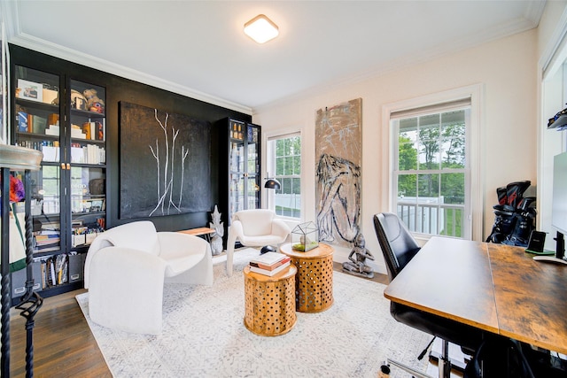 home office with ornamental molding and dark wood-style flooring