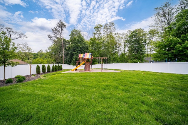 view of yard featuring a playground