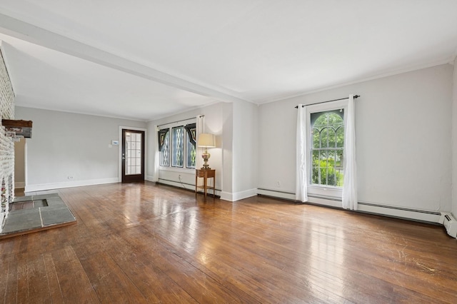 2600 Garden St, Baldwin, NY 11510 - unfurnished living room with plenty of natural light, hardwood / wood-style floors, a baseboard heating unit, and baseboards