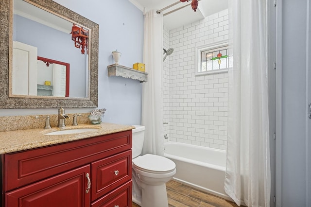 2600 Garden St, Baldwin, NY 11510 - bathroom with wood finished floors, toilet, shower / tub combo with curtain, and vanity