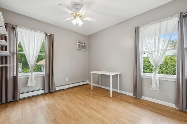 2600 Garden St, Baldwin, NY 11510 - spare room with light wood-type flooring, healthy amount of natural light, baseboard heating, and ceiling fan