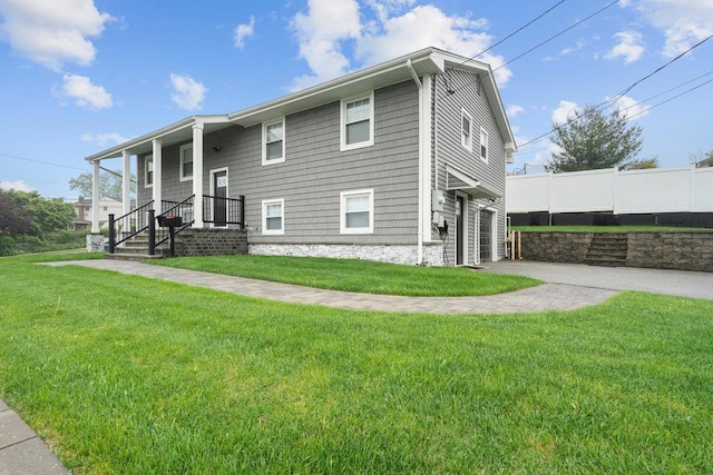 181 Central Park Rd E, Plainview, NY 11803 - view of front of home featuring a front yard