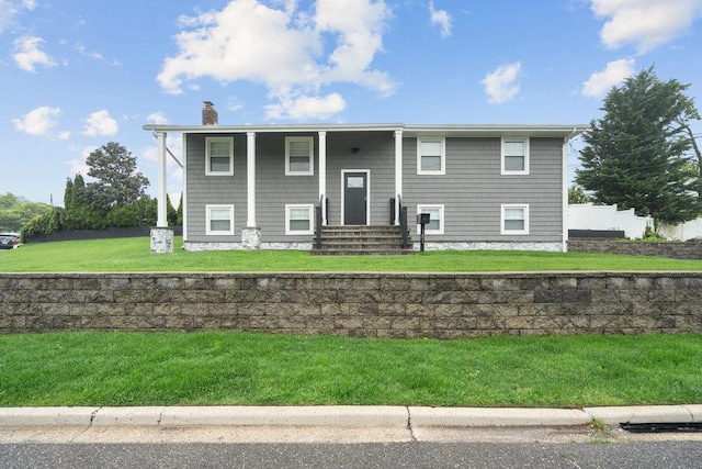 181 Central Park Rd E, Plainview, NY 11803 - raised ranch featuring a chimney, entry steps, and a front yard