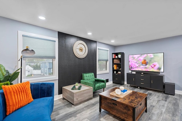 181 Central Park Rd E, Plainview, NY 11803 - living room featuring wood finished floors, recessed lighting, and baseboards